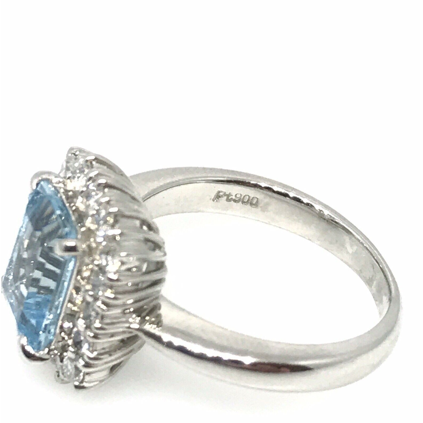 2.08 carat Emerald Cut Aquamarine & Diamond Halo Ring in Platinum