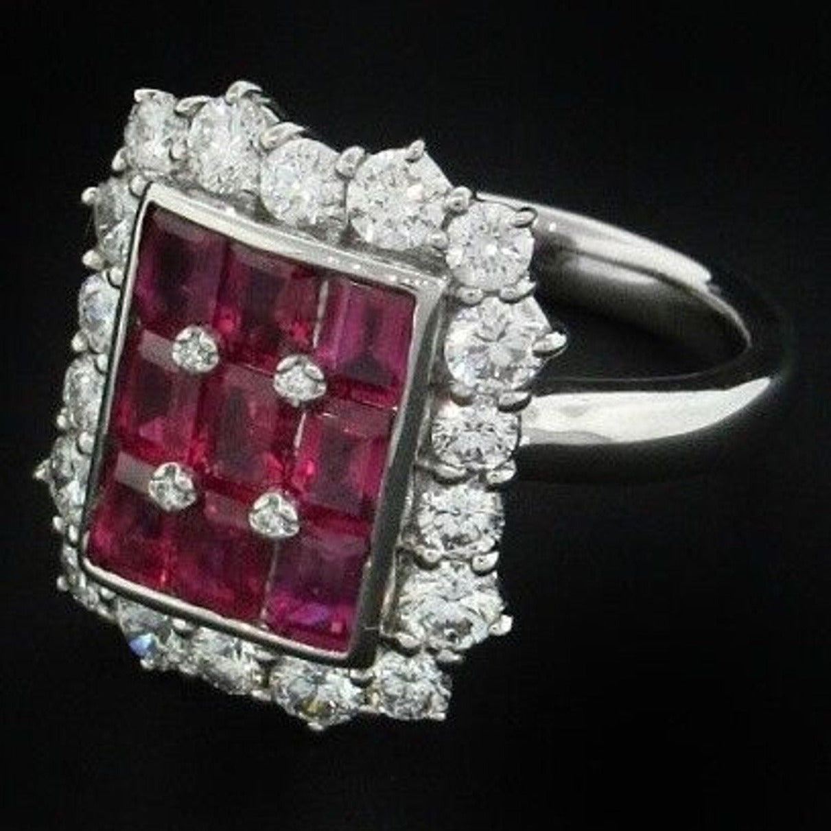 3.21 carats Ruby Baguette and Round Diamond Ring in Platinum