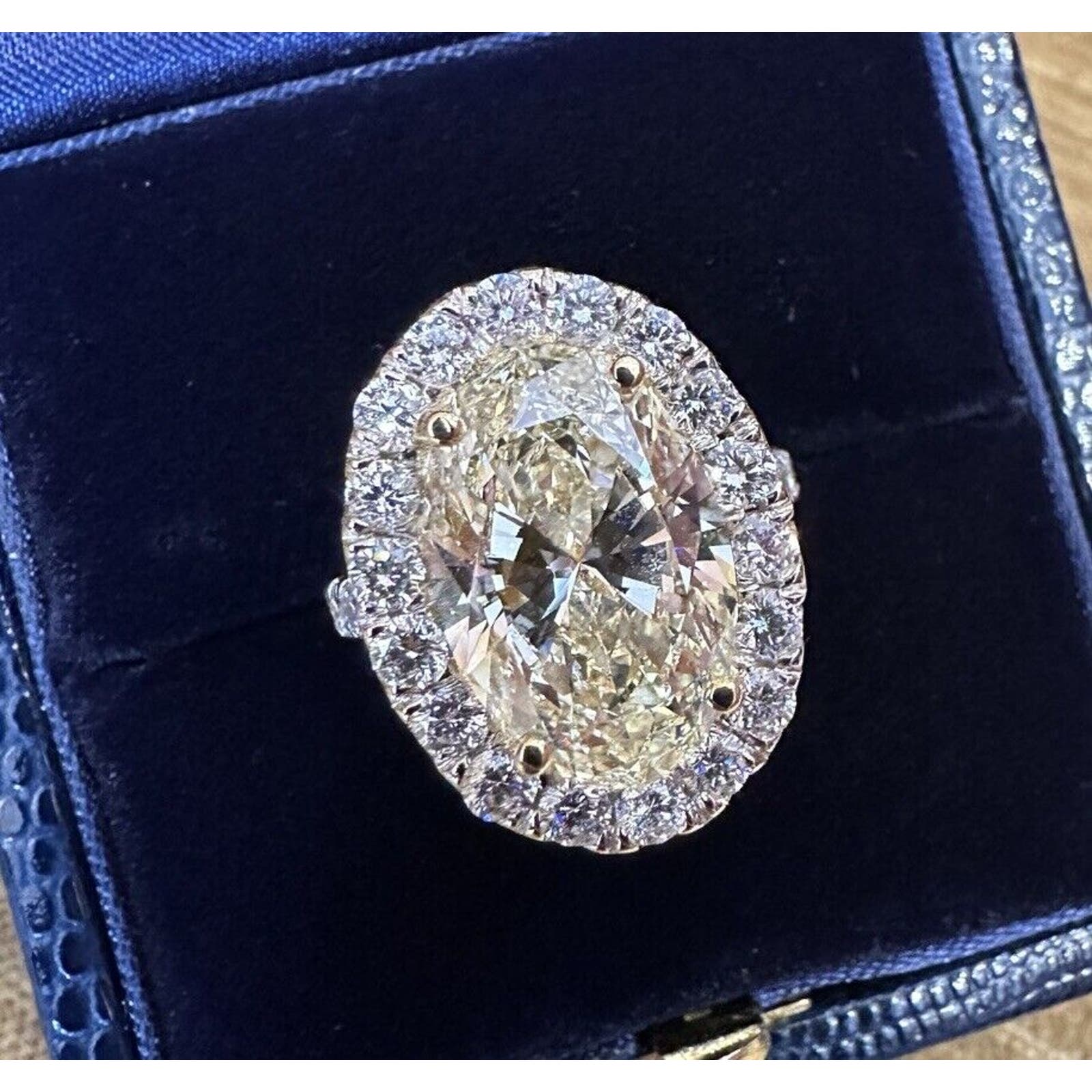 GIA 6.05 carat Oval Brilliant Yellow Diamond Halo Ring in 18k Gold - C300EB