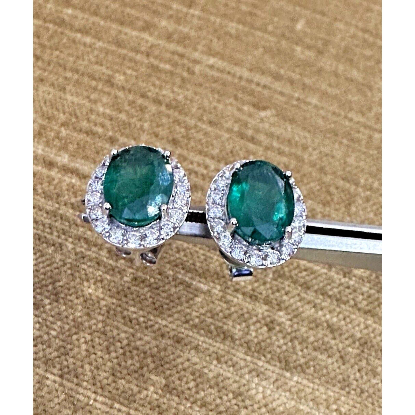 Natural Oval Emerald Stud Earrings with Diamond Halo in 14k White Gold
