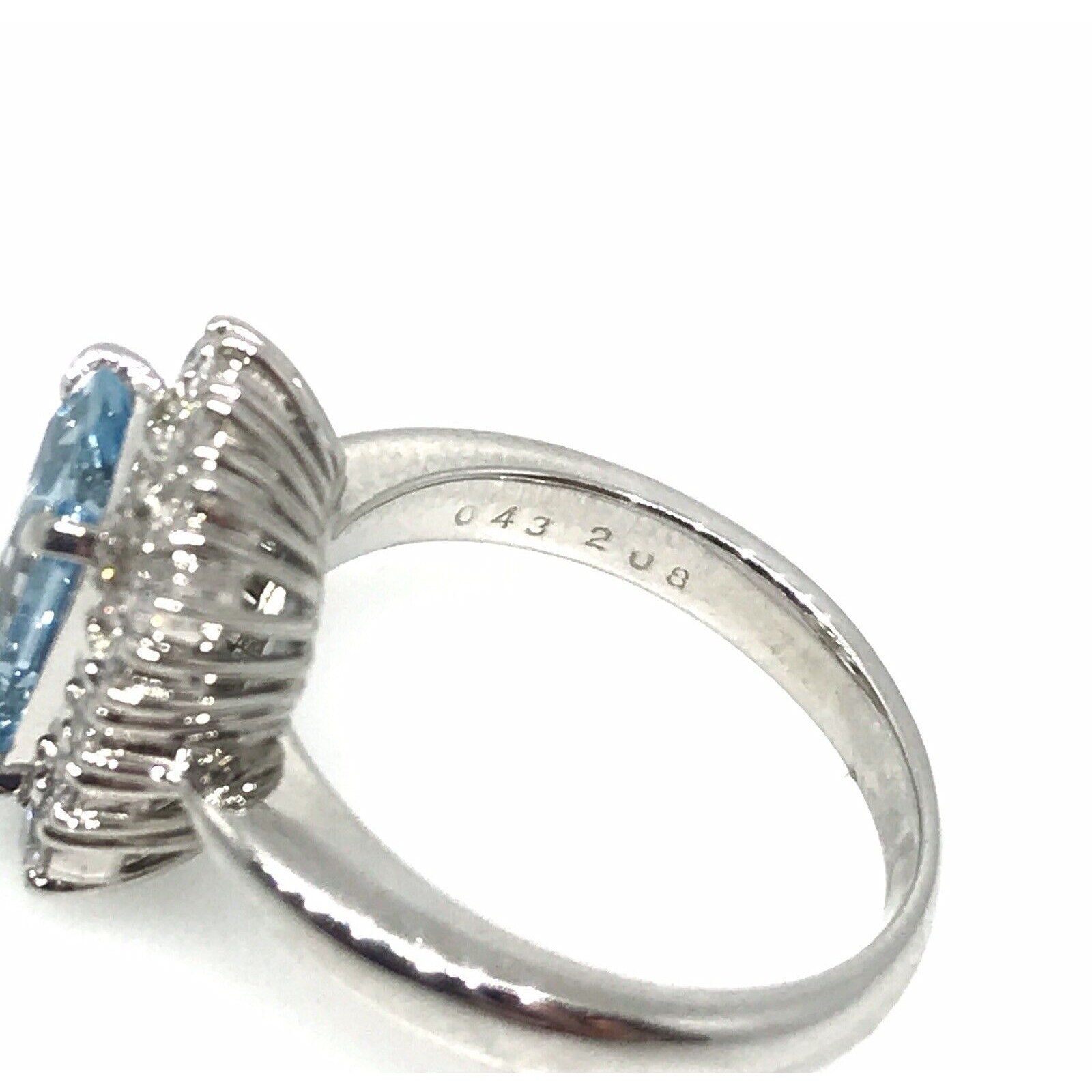 2.08 carat Emerald Cut Aquamarine & Diamond Halo Ring in Platinum