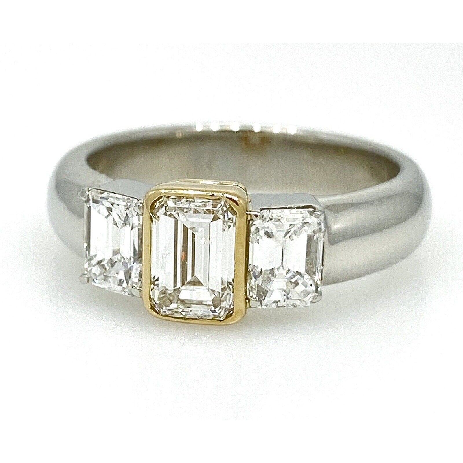 Three Stone Emerald Cut Diamond Ring in Platinum /18k Yellow Gold