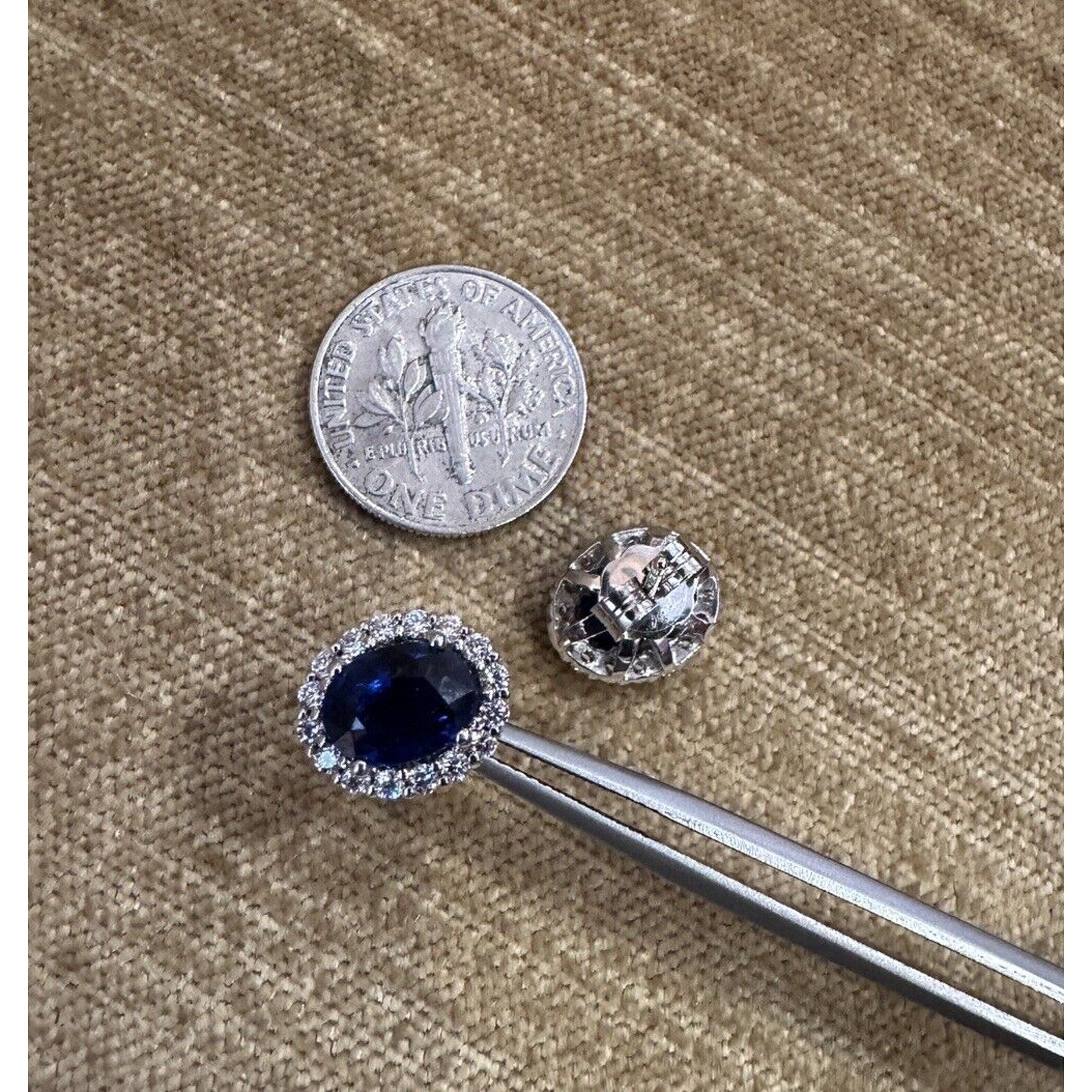 Oval Blue Sapphire and Diamond Halo Earrings in 14k White Gold