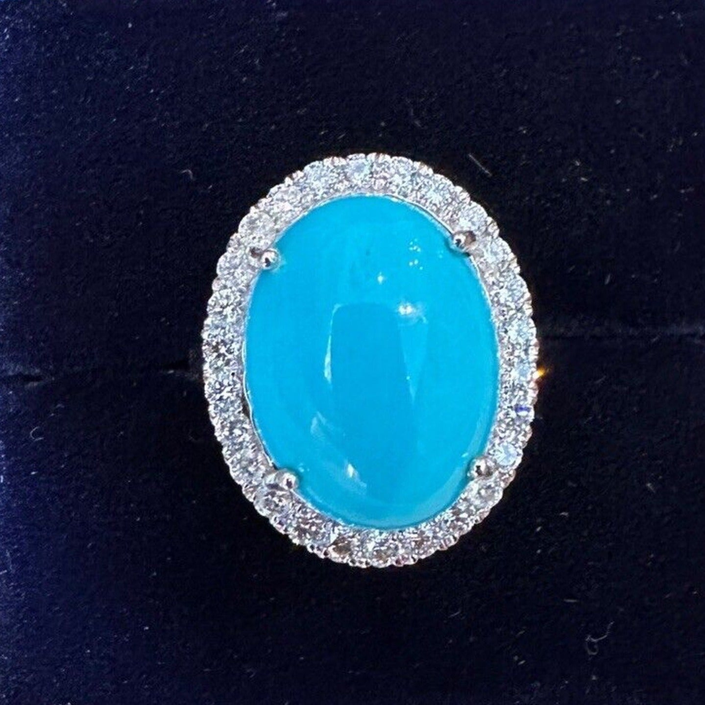 Oval Turquoise and Diamond Halo Ring in 18k White Gold
