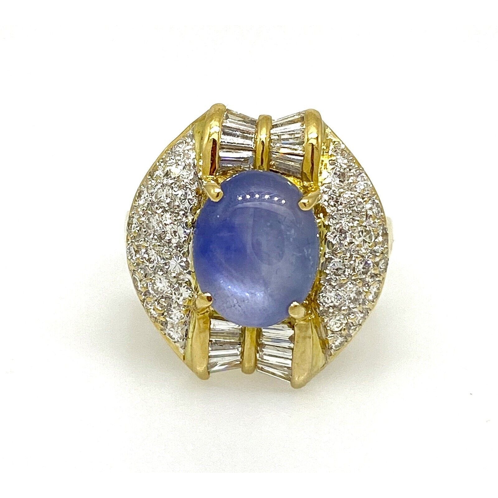 6.24 carat Oval Star Sapphire with Pave Diamonds in 18k Yellow Gold