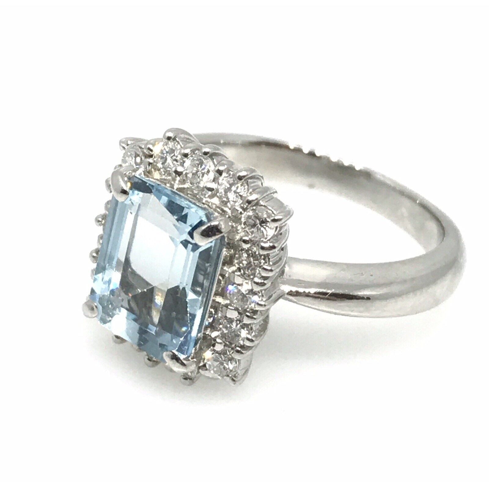 2.08 carat Emerald Cut Aquamarine & Diamond Halo Ring in Platinum