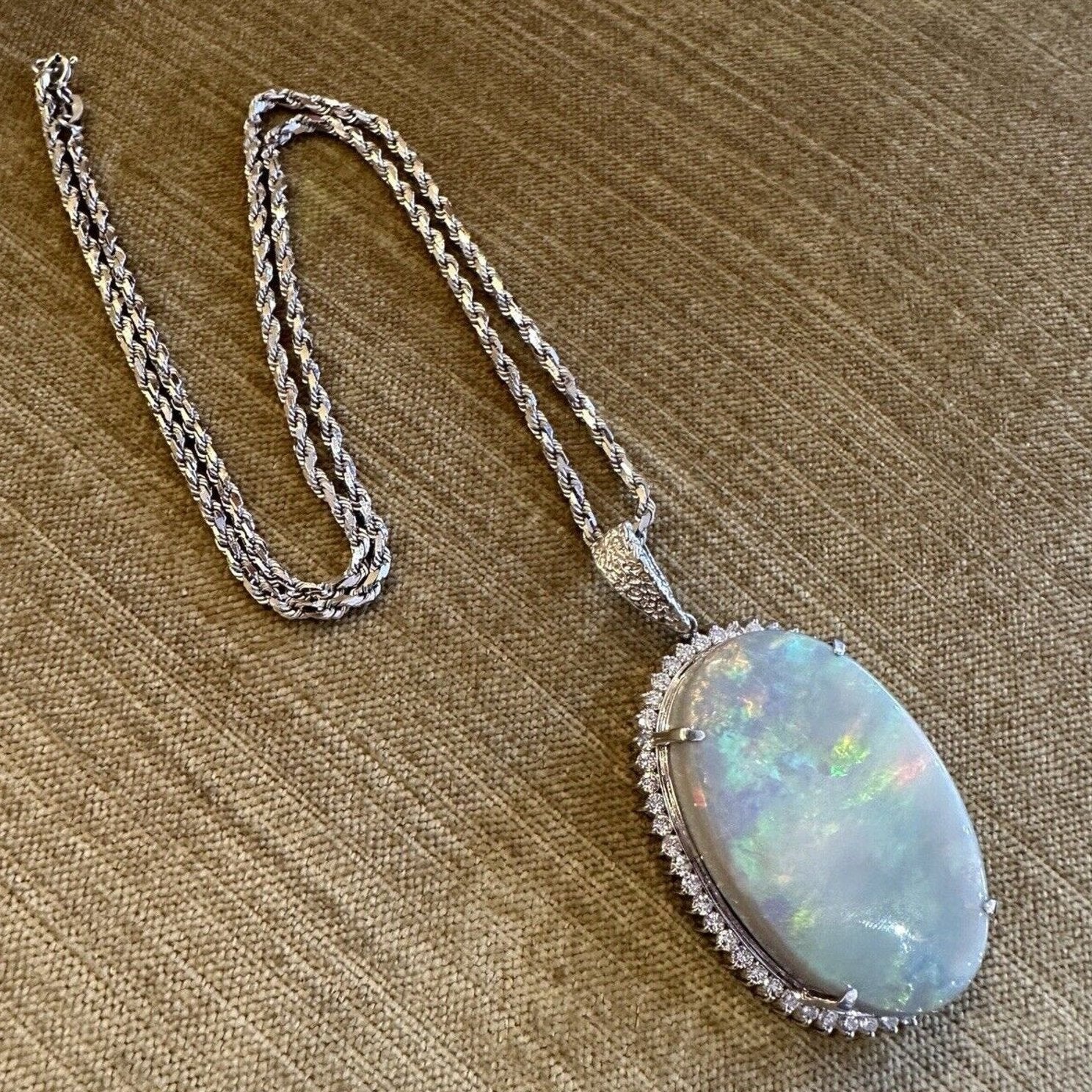 GIA Grey Opal 59.90 carat with Diamond Halo Pendant in Platinum / 18k White Gold